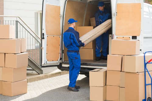 Staff and customers using a safe self storage corridor