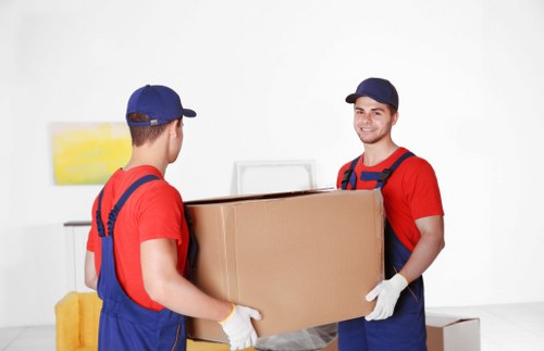 Packing boxes and furniture ready for self storage in Twickenham