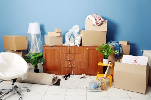 Professional house removals team preparing furniture for a Twickenham home move