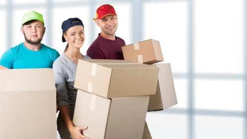 Moving team handling stairs and access challenges in a Twickenham flat
